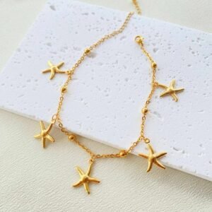 Tornozeleira Dourada com Estrelas do Mar